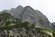 Le rocciose pareti del Pizzo Cavregasco in fondo alla vallata